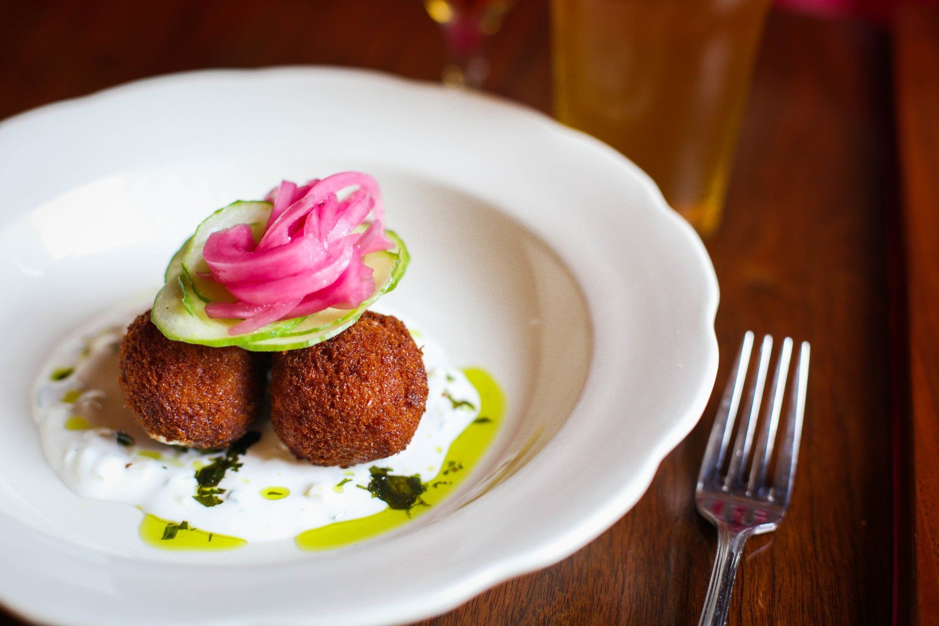 burger with a side of chicken wings