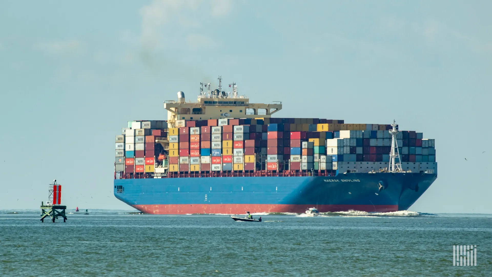A container ship arriving at the Port of Houston ( A container ship arriving at the Port of Houston (