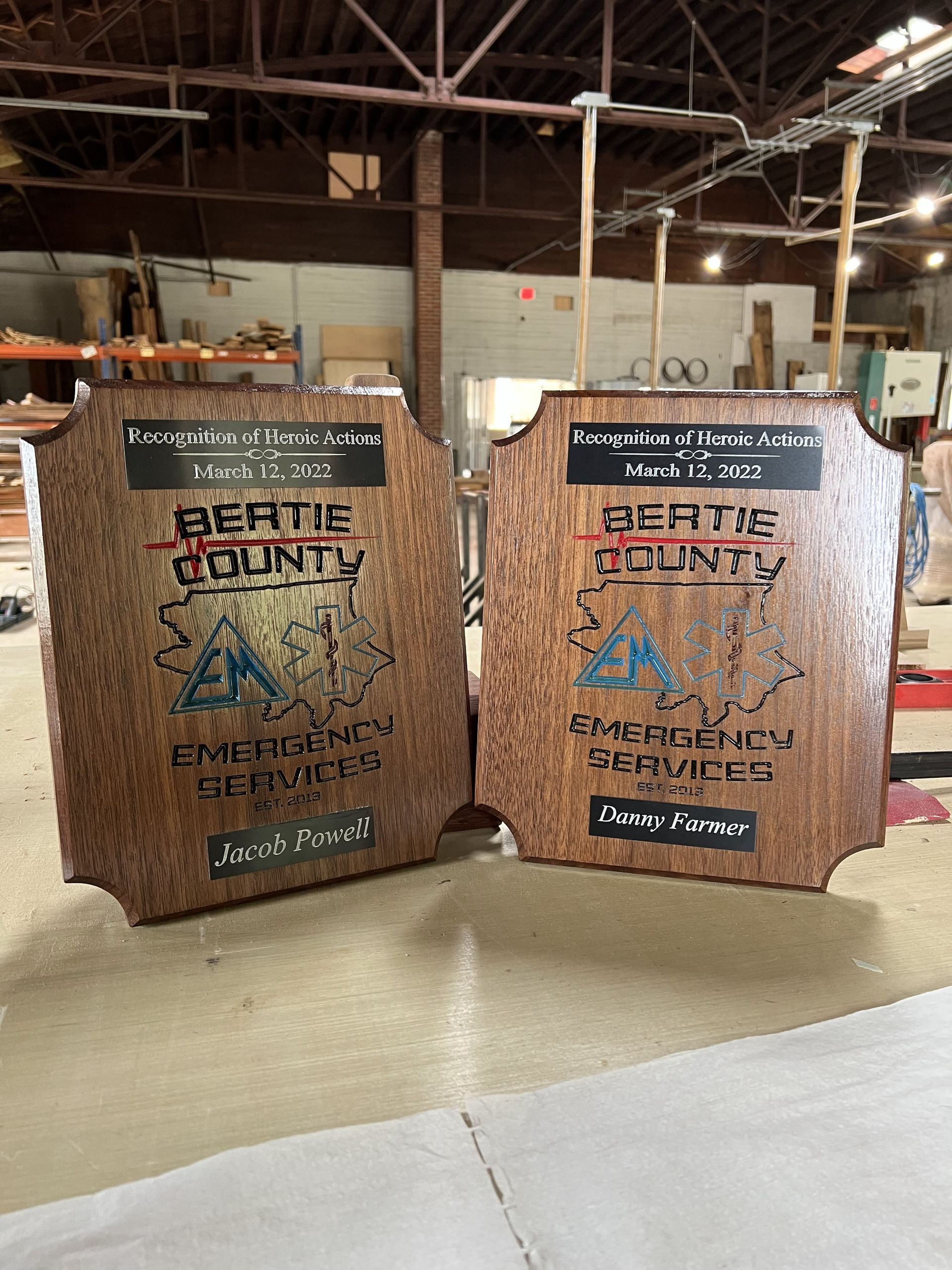 Two wooden plaques with the words bernie county written on them