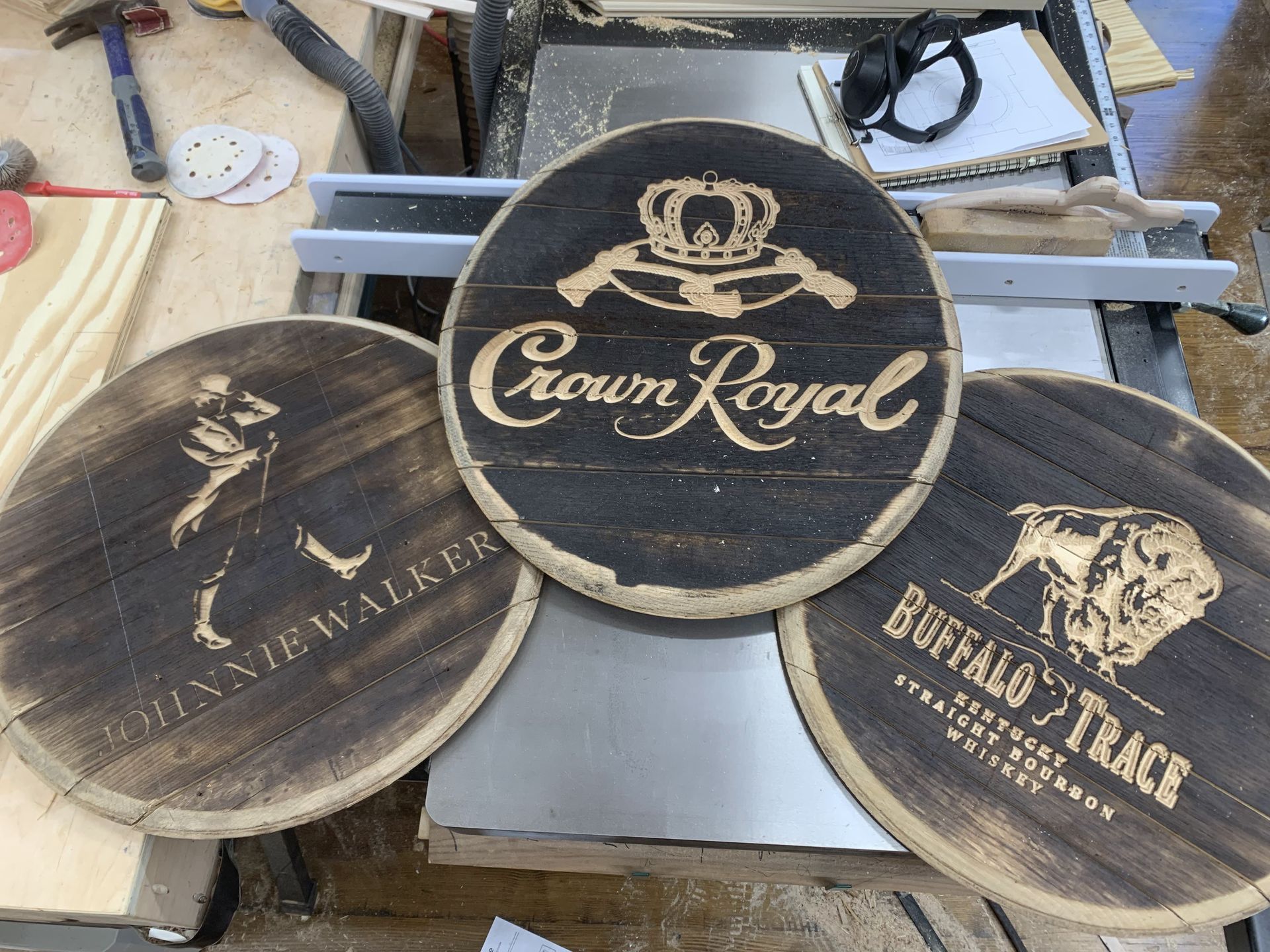 A wooden sign that says crown royal on it