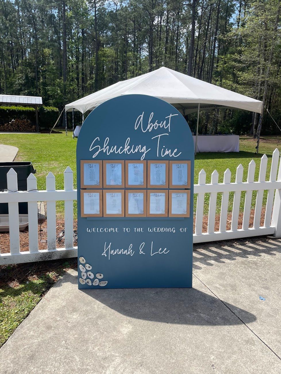 A wooden shelf is sitting next to a red truck.
