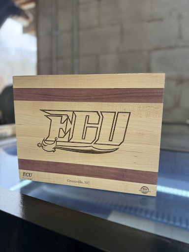 A wooden box with the word ebu on it