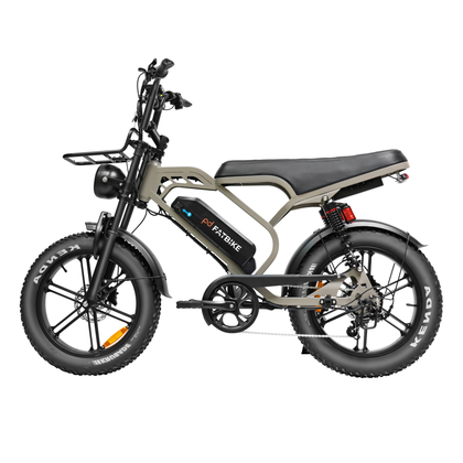 Gray and black electric bike with fat tires, front basket, and battery.