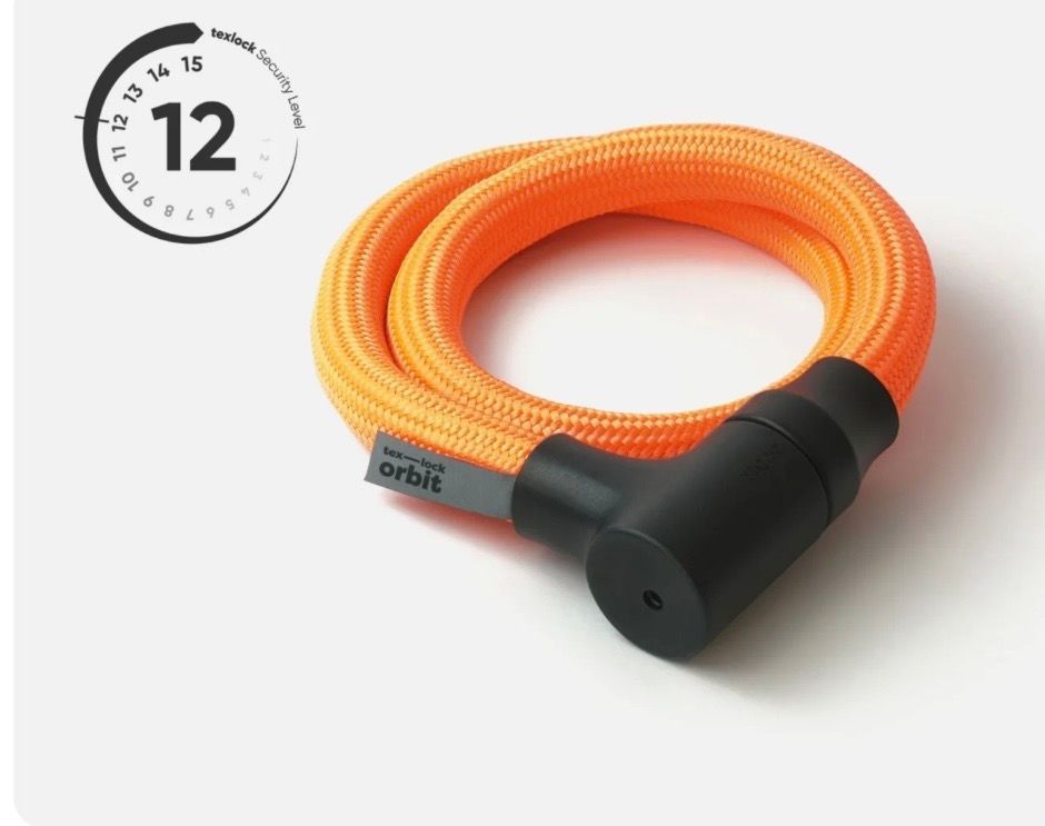 Orange bicycle lock, black locking mechanism, 