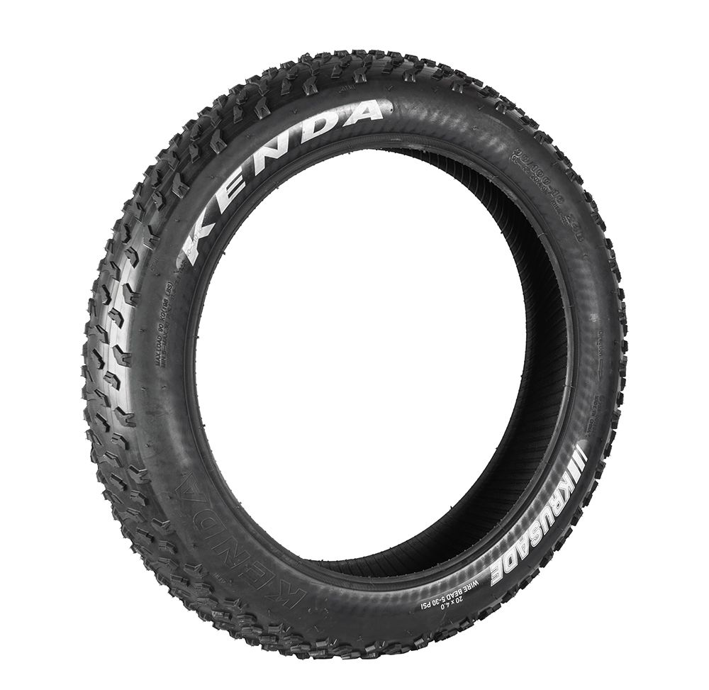 Black Kenda Krusade bicycle tire with white lettering and knobby tread.