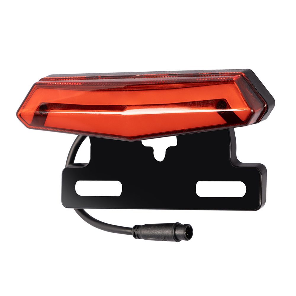 Red taillight with black bracket and wire with a connector.