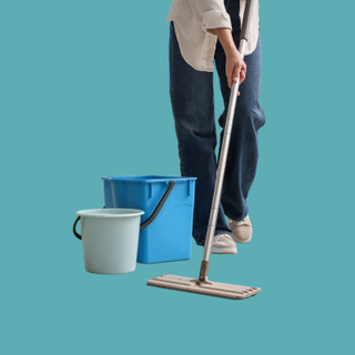 Person mopping floor with buckets of water beside them on blue background.