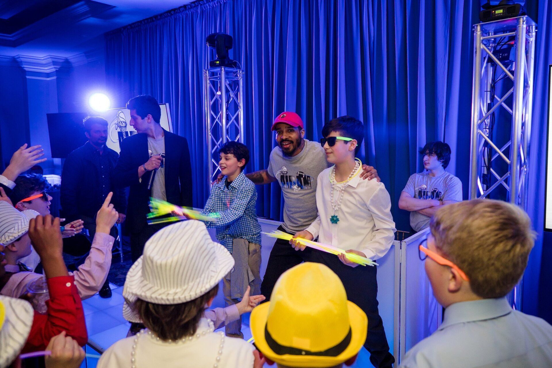 Bar mitzvah event with multiple guests dancing.