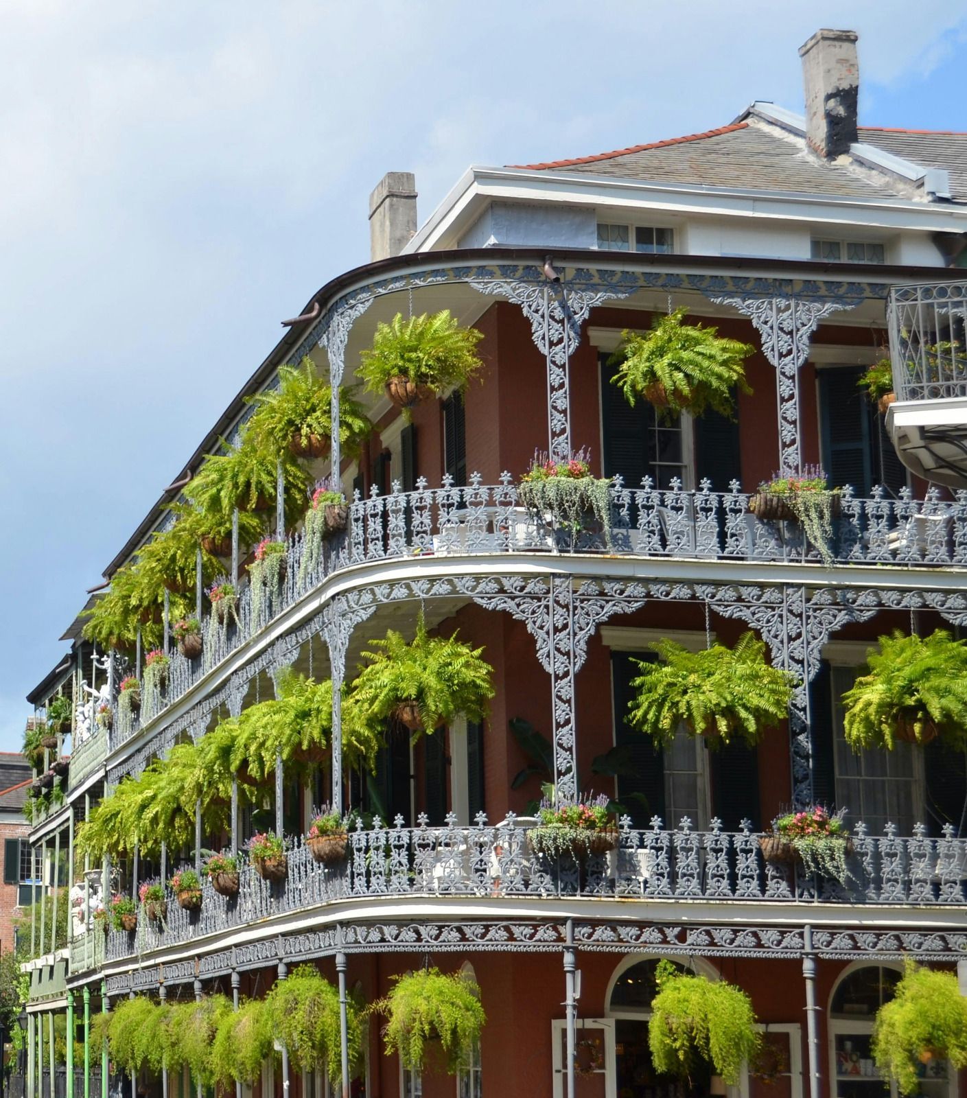 A house with a garage and a driveway on a rainy day.