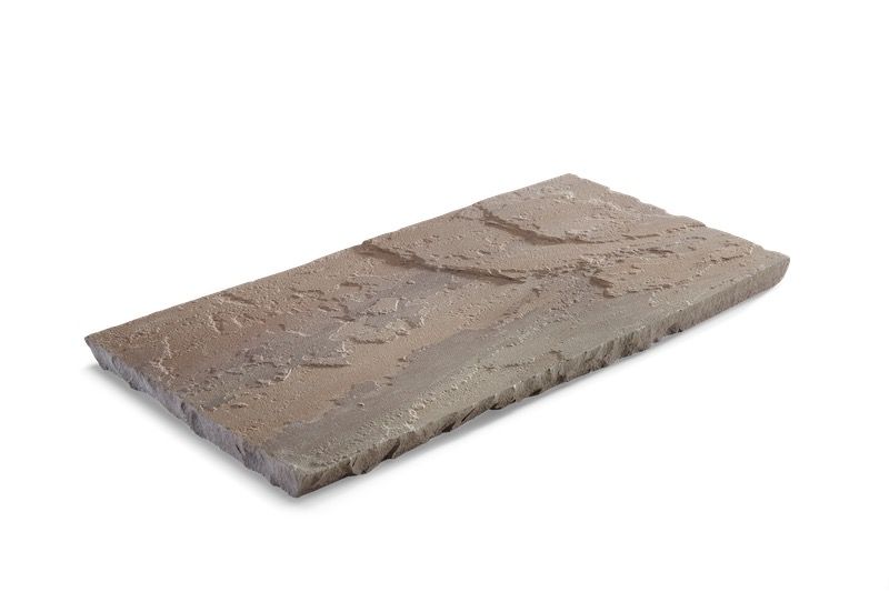 Rectangular brick, textured gray-brown surface.