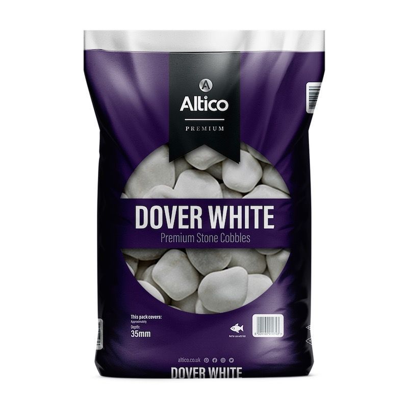 Bag of Dover White premium stone pebbles. White stones are displayed on a purple background.