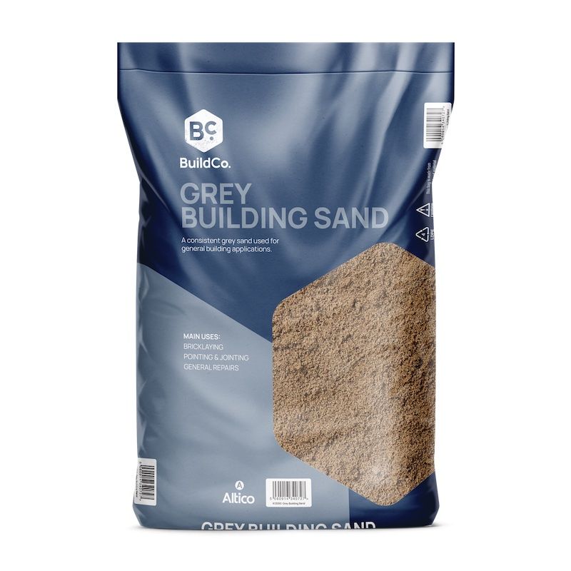 Bag of grey building sand by BuildCo. showing the sand's texture.