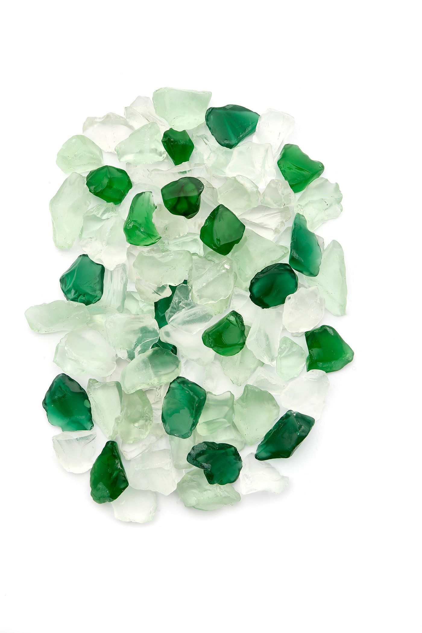 Pile of assorted green and clear sea glass against a white background.
