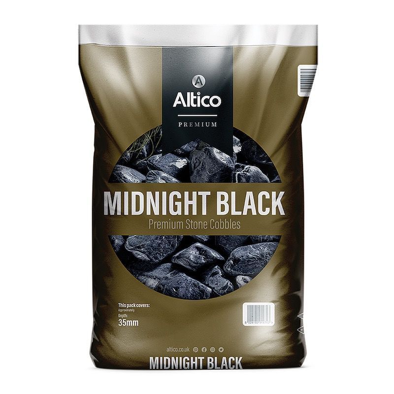 Bag of Midnight Black premium stone pebbles. Dark gray stones in a dark bag with black and gold text.