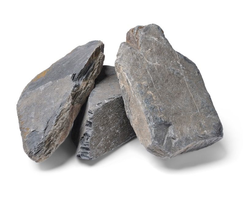 Three gray, irregularly shaped slate stones stacked on a white background.