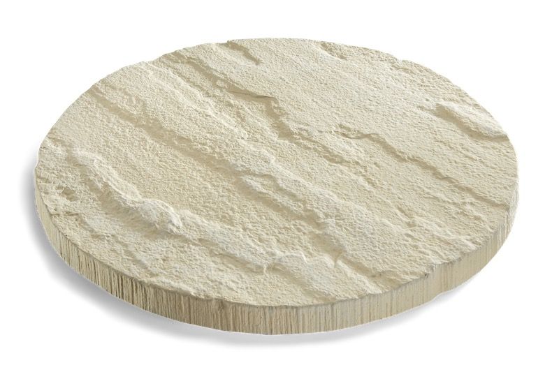 Circular, cream-colored stepping stone with layered, textured surface.