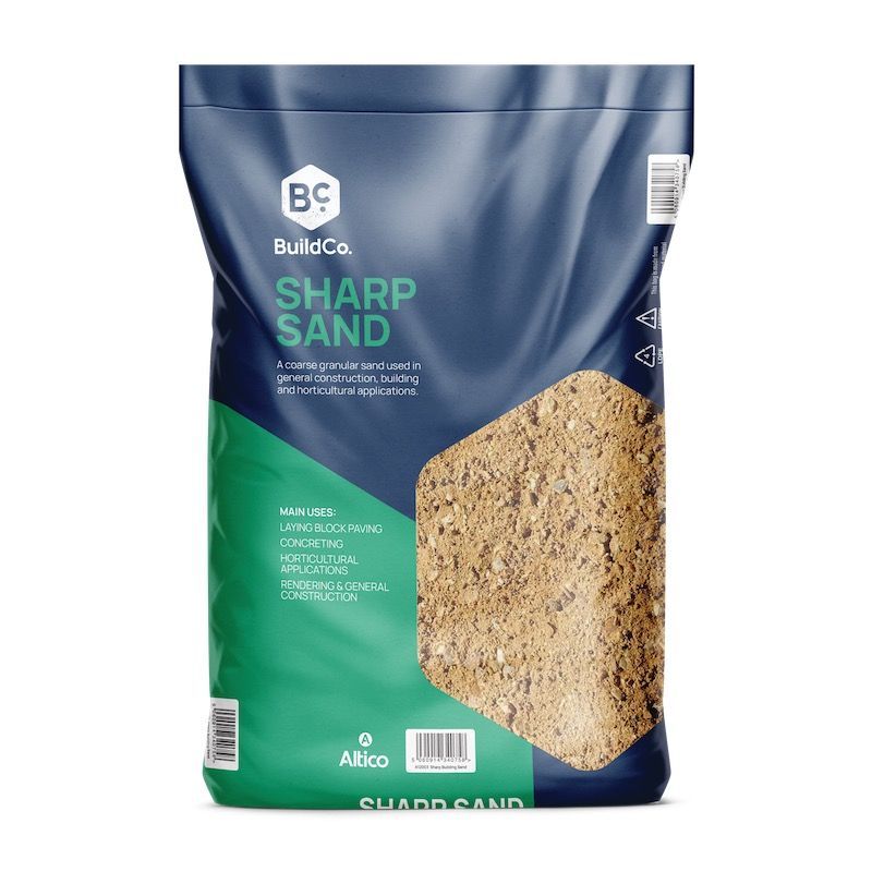 Bag of BuildCo Sharp Sand, with green and blue packaging, showing sand texture.