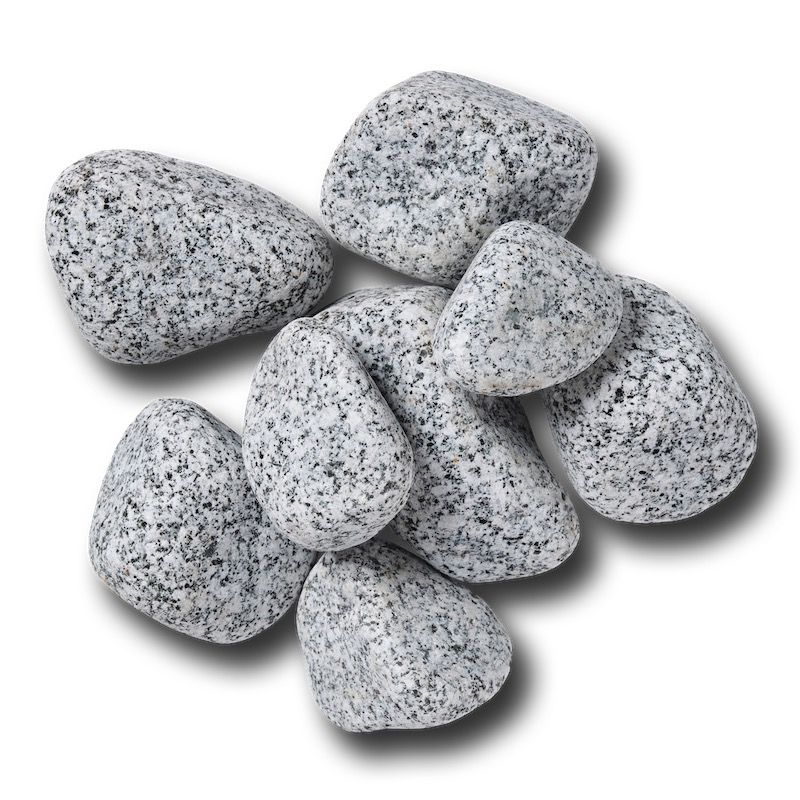Pile of gray and white speckled river rocks.