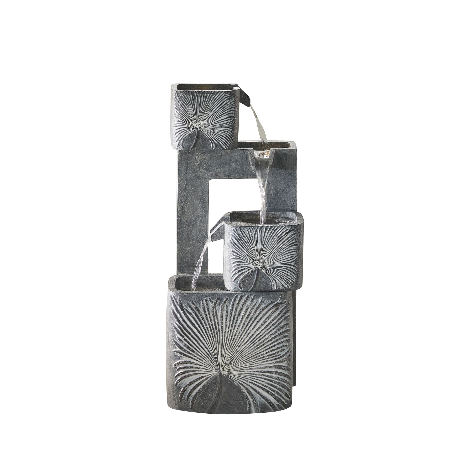 Stone-look water fountain with cascading water from square containers. Grey, with carved floral design.