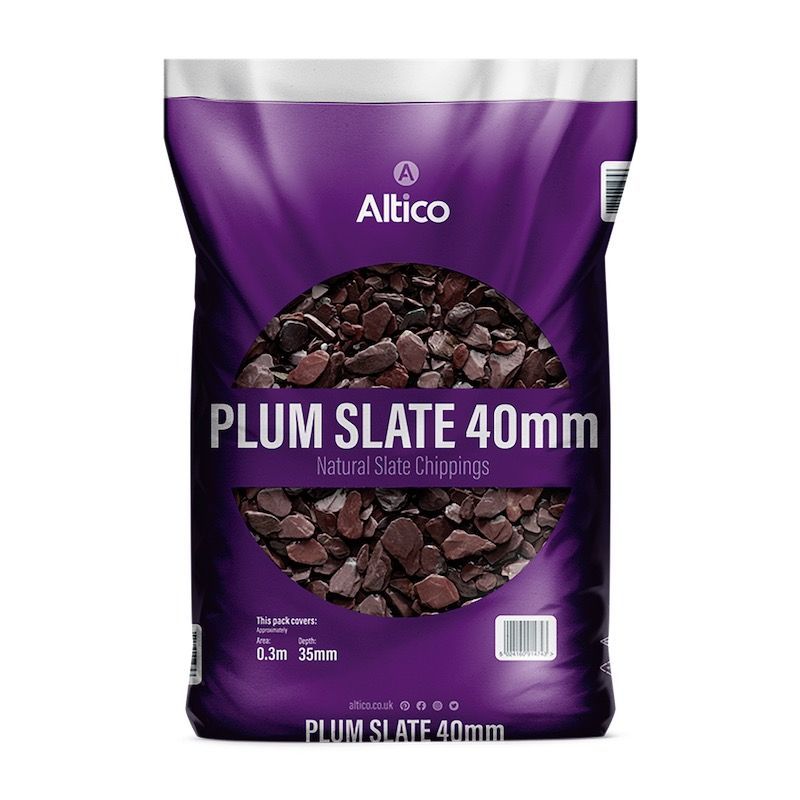 Bag of Plum Slate 40mm, natural slate chippings, with purple and white packaging and dark stone pieces.