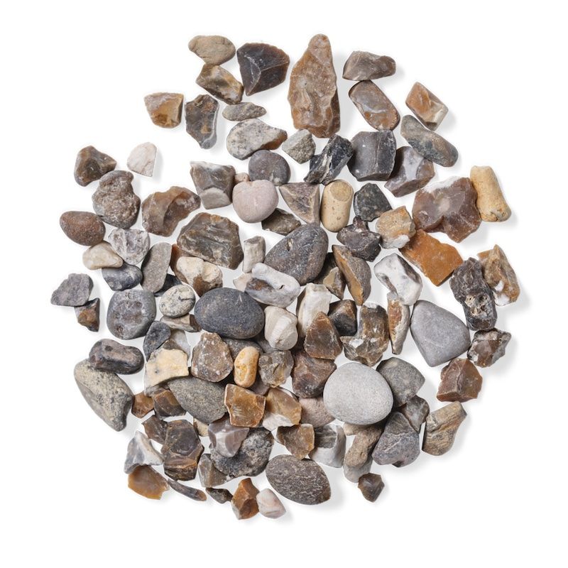 Pile of mixed-color gravel on a white background.
