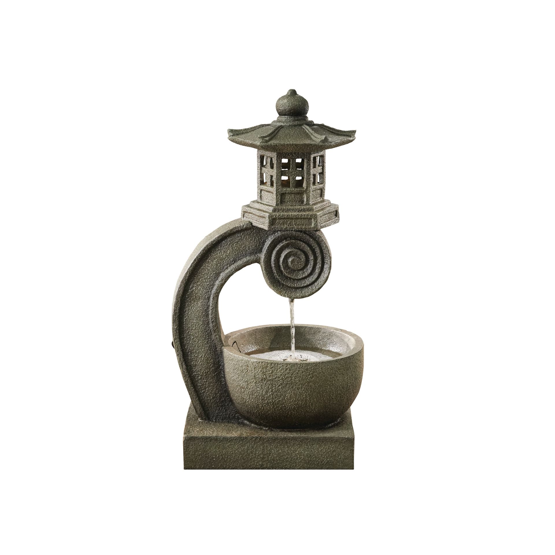 Japanese-style outdoor water fountain with pagoda, bowl, and flowing water. Gray stone texture.