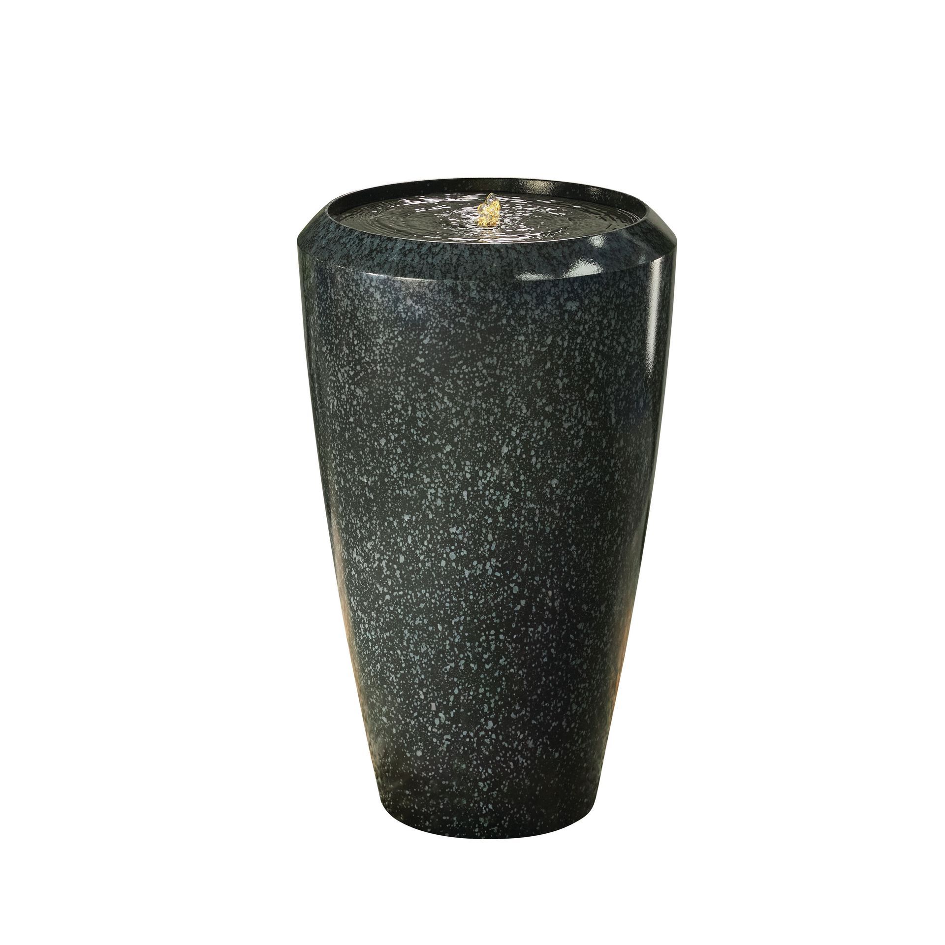 Black speckled water fountain. Cylindrical shape, water visible at the top.