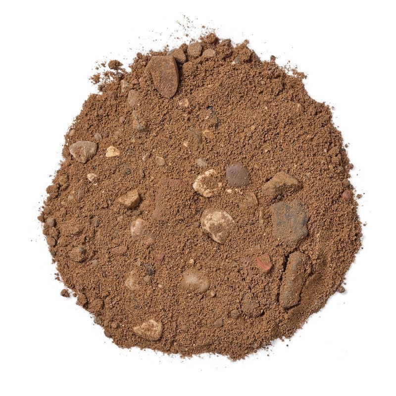 Pile of brown soil with small stones.
