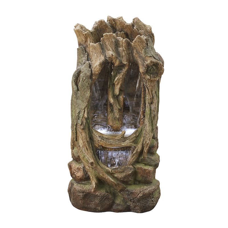 Fountain shaped like a tree trunk, water cascading down, brown and tan colors.