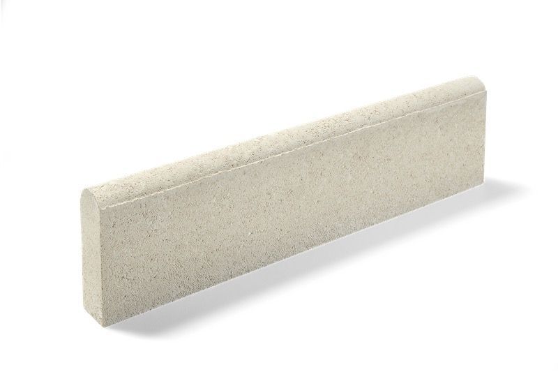 Beige concrete curb, rectangular with rounded top edge, on a white background.