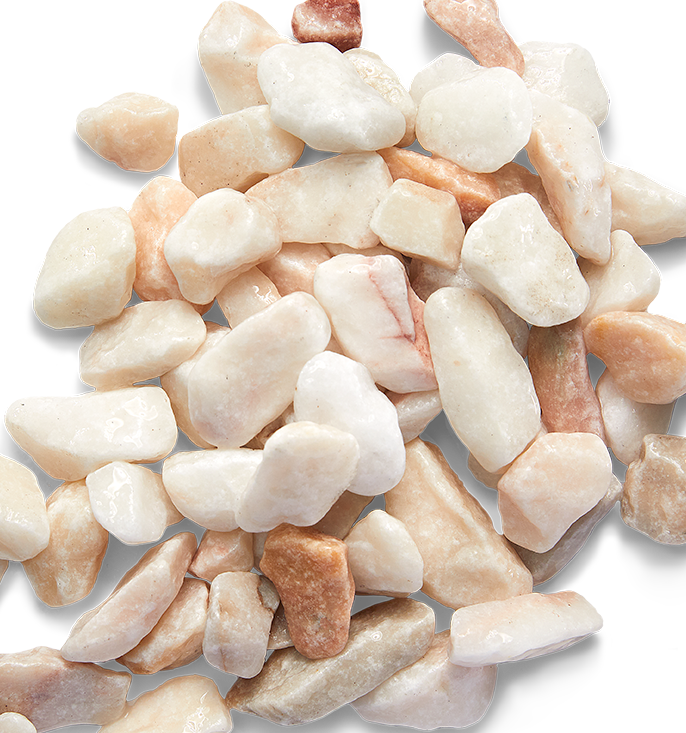 Pile of smooth, white and light peach-colored river rocks.