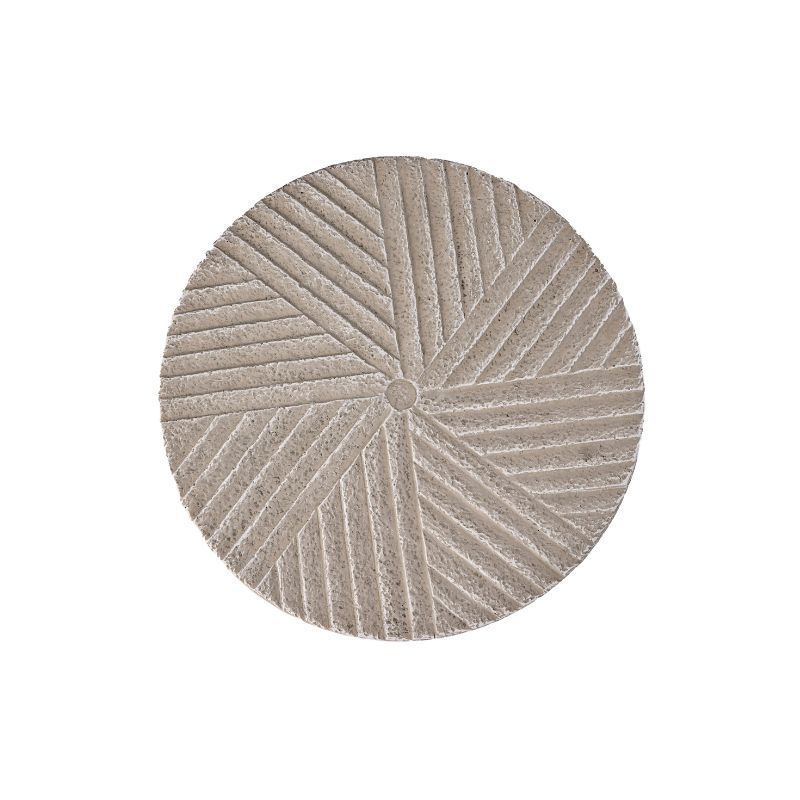 Circular, beige stone doormat with angled linear grooves radiating from the center.