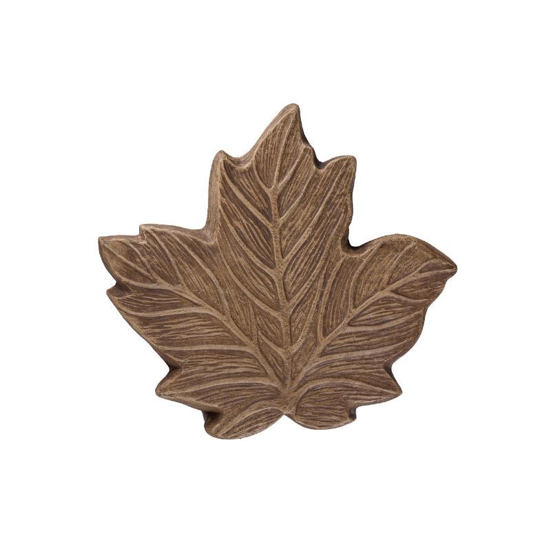 Brown, carved maple leaf decoration with detailed veining.