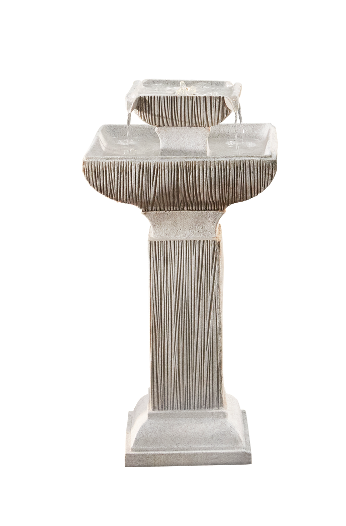 A tiered outdoor fountain made of rock-like material, water cascading down through the levels.