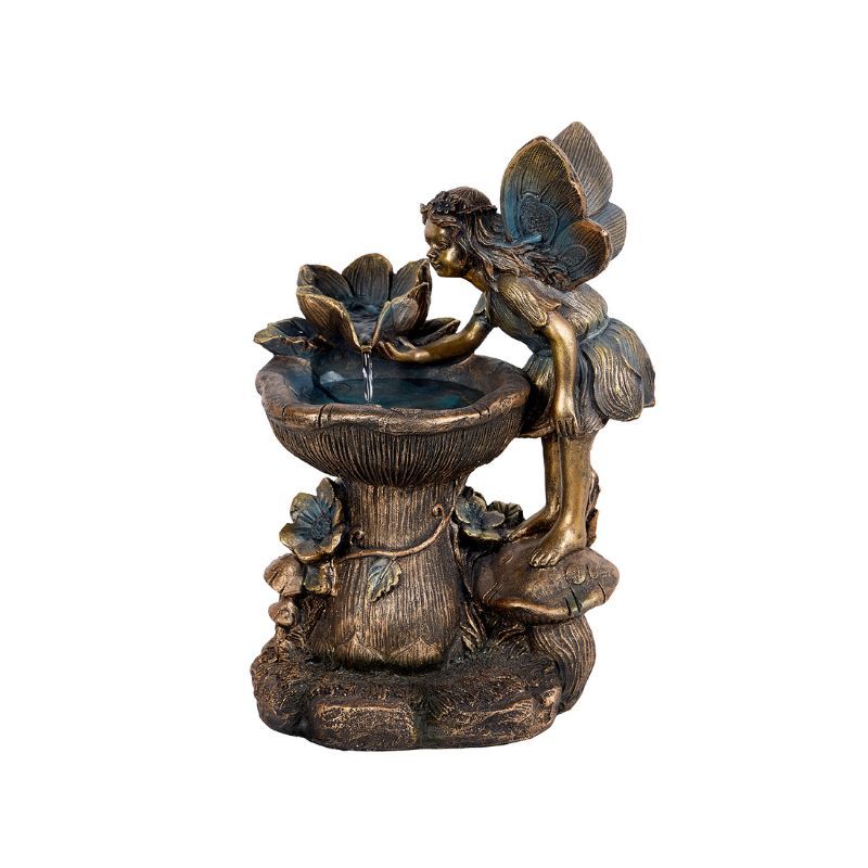 Fairy statue with a water fountain. Bronze colored fairy leans over a bowl, with water flowing.