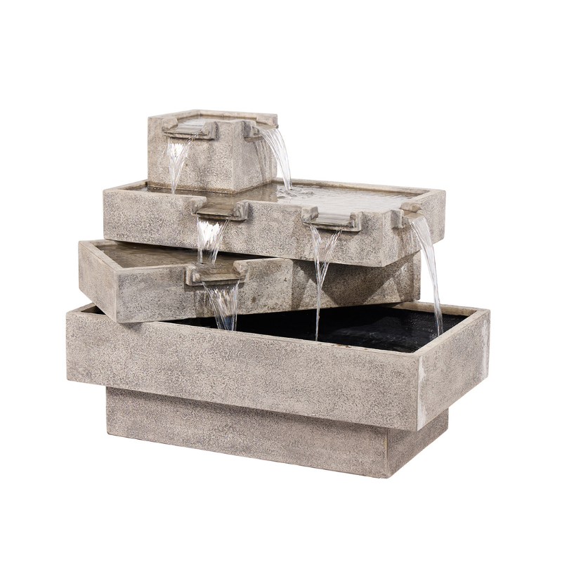 Stone tiered outdoor water fountain with cascading water.