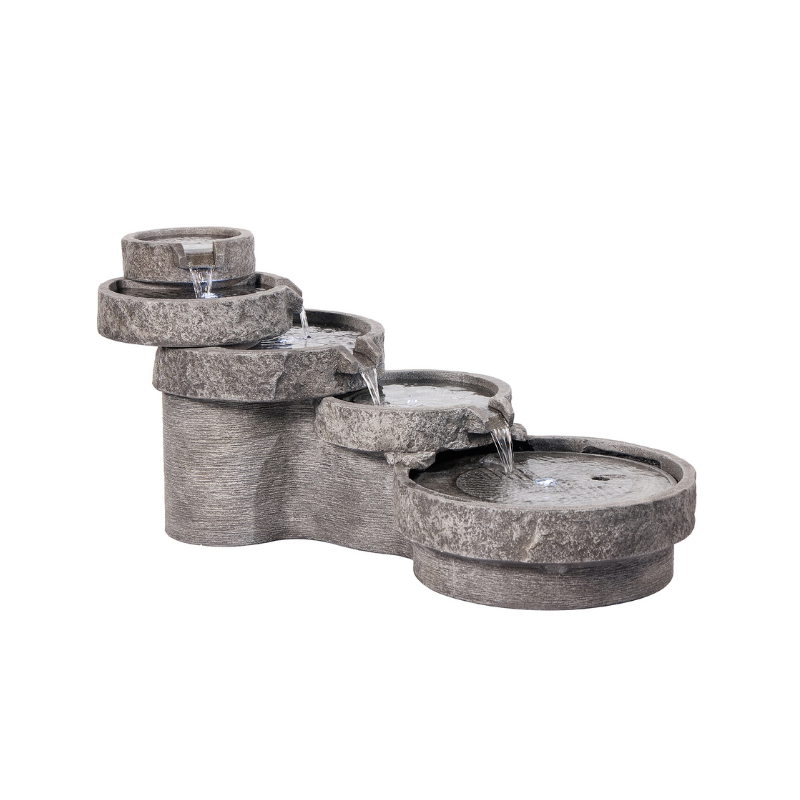 Grey tiered outdoor water fountain with cascading water.