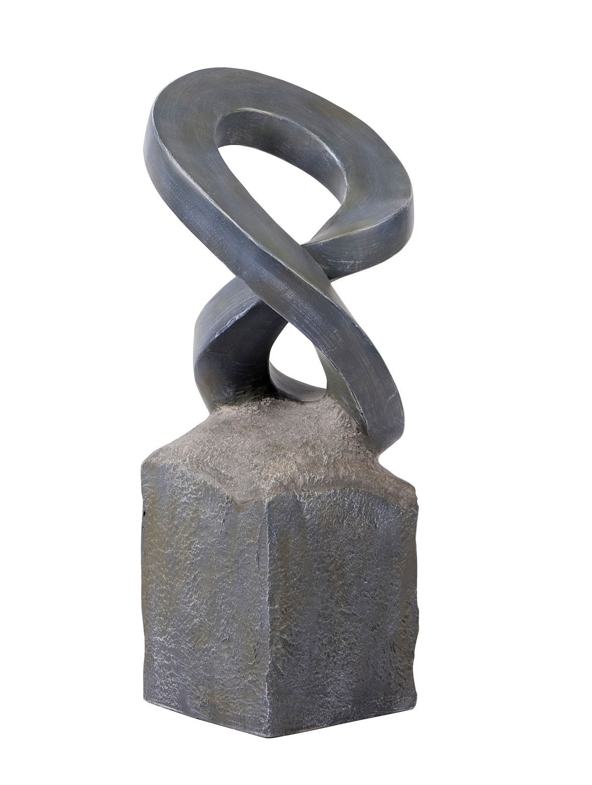 Sculpture of a dark gray, twisted metal figure on a square, stone-like base.