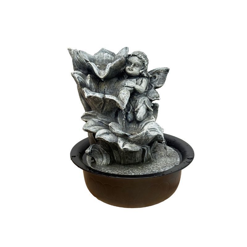 Fountain with fairy figurine. Grey finish, water flows from lotus flower into a black bowl.
