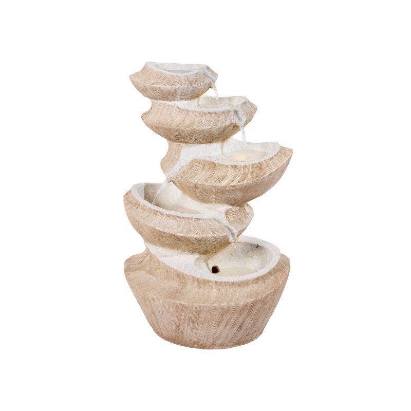 Stone-colored, layered water fountain with water flowing down in a spiral design.