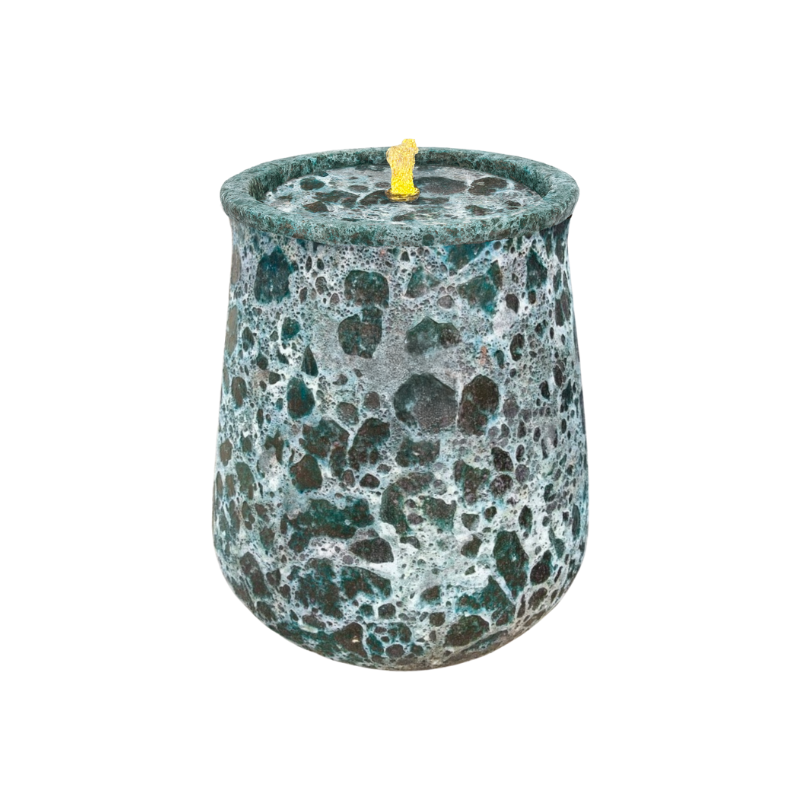 Blue and white speckled jar with a yellow wick.