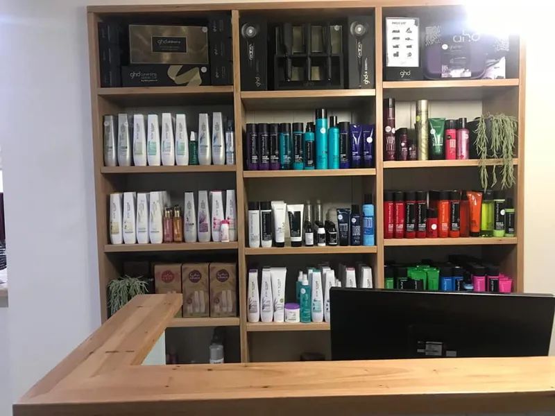 A Shelf Full Of Hair Products Including Shampoo And Conditioner — Johnson's Timber Agencies In Ulladulla, NSW