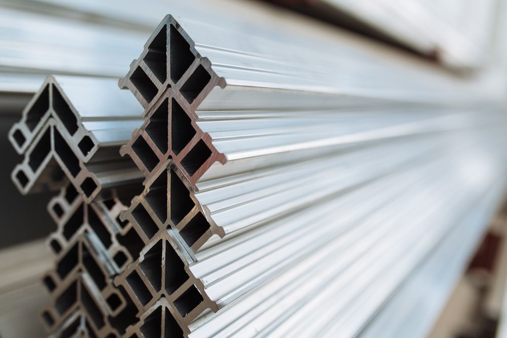 A Close Up Of A Stack Of Aluminum Profiles — Johnson's Timber Agencies In Ulladulla, NSW