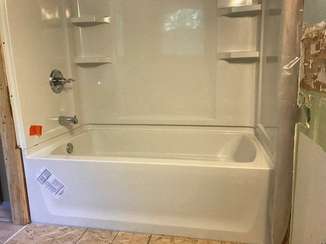 Installed Bathtub — Jefferson, WI — Precision Plumbing Services
