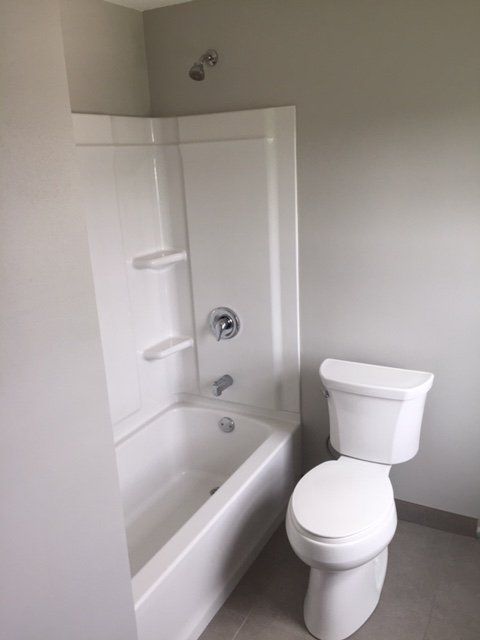 Toilet and Bathtub — Jefferson, WI — Precision Plumbing Services