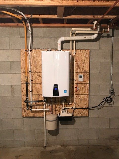 New Water Heater in Basement — Jefferson, WI — Precision Plumbing Services