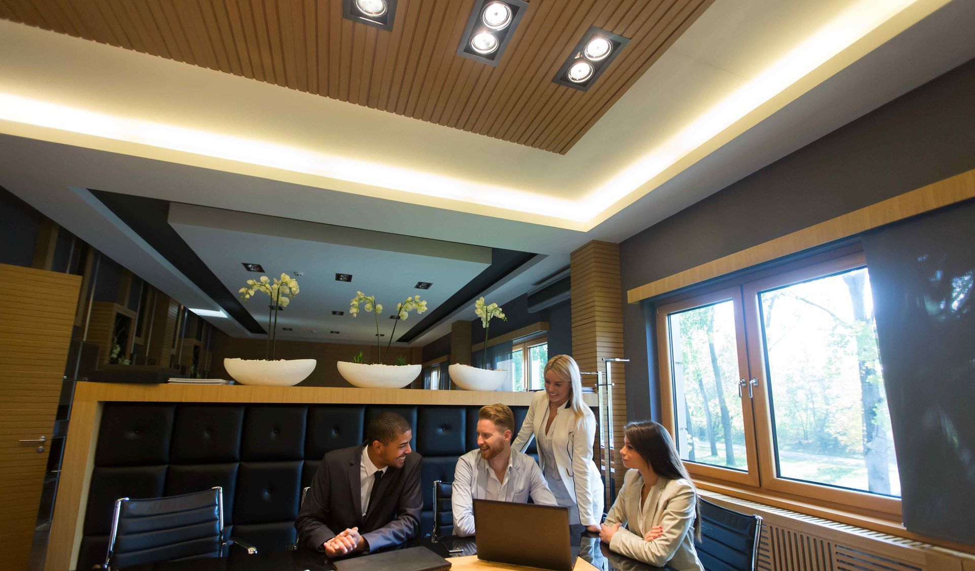 Group of Business People In Meeting Room With Good Lighting
