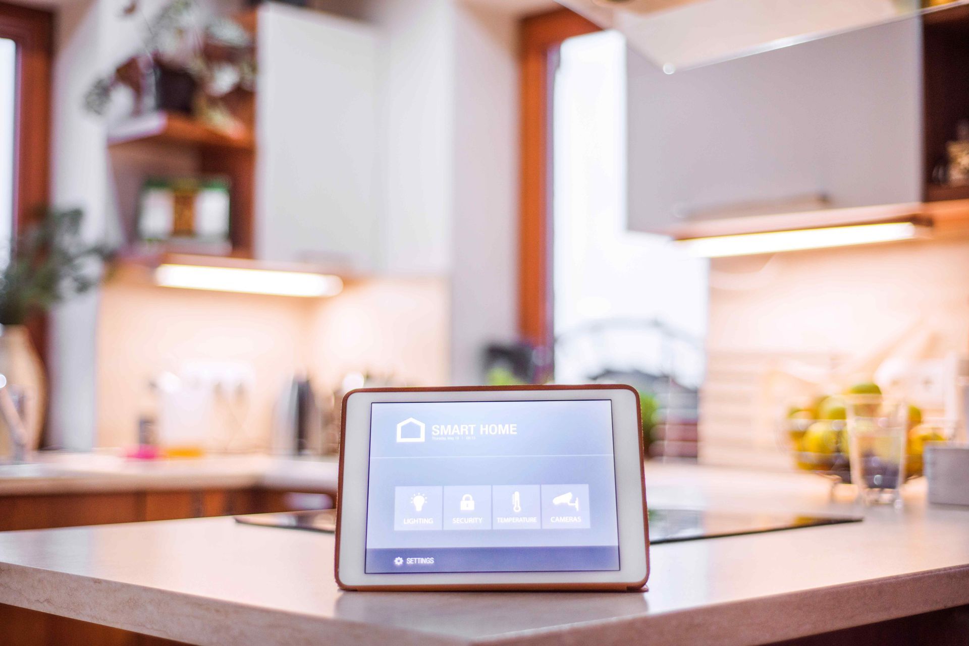 Smart Home Controlled By Tablet In Kitchen