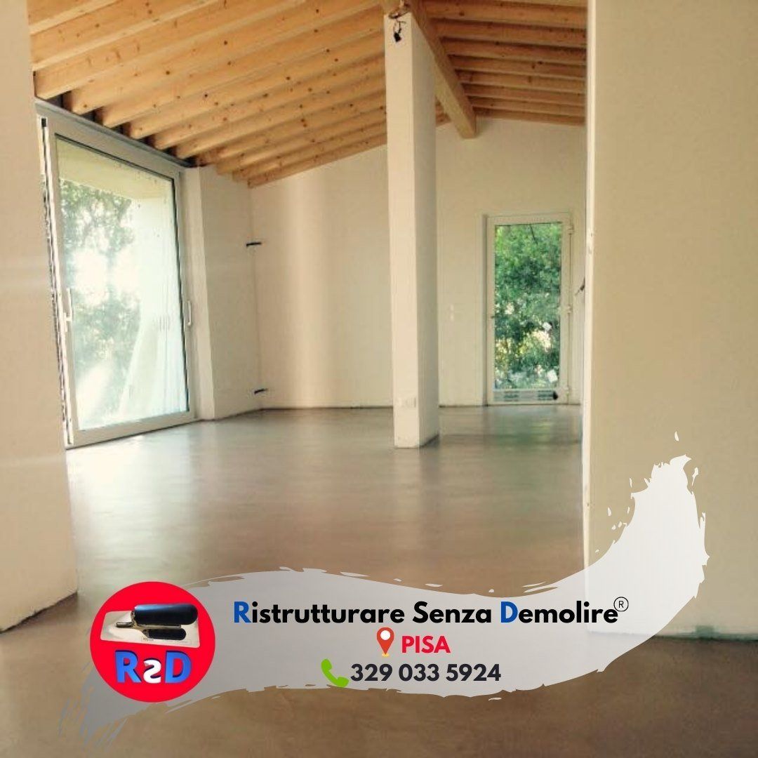 pavimento microcemento e travi a vista