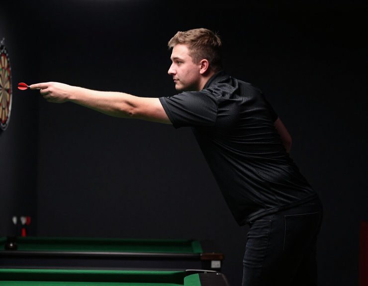 Player at the oche in focused training session